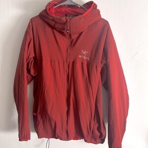 Arcteryx men’s red puffy jacket. Very lightweight and very warm. Size XL